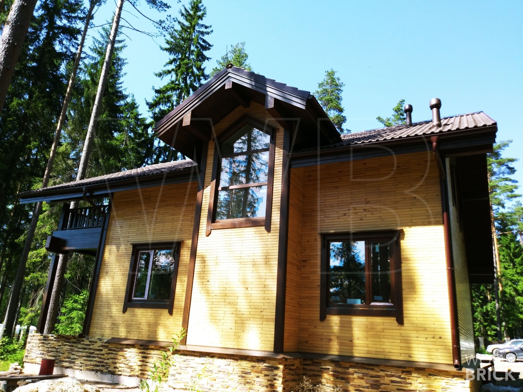 Дом из деревянного кирпича